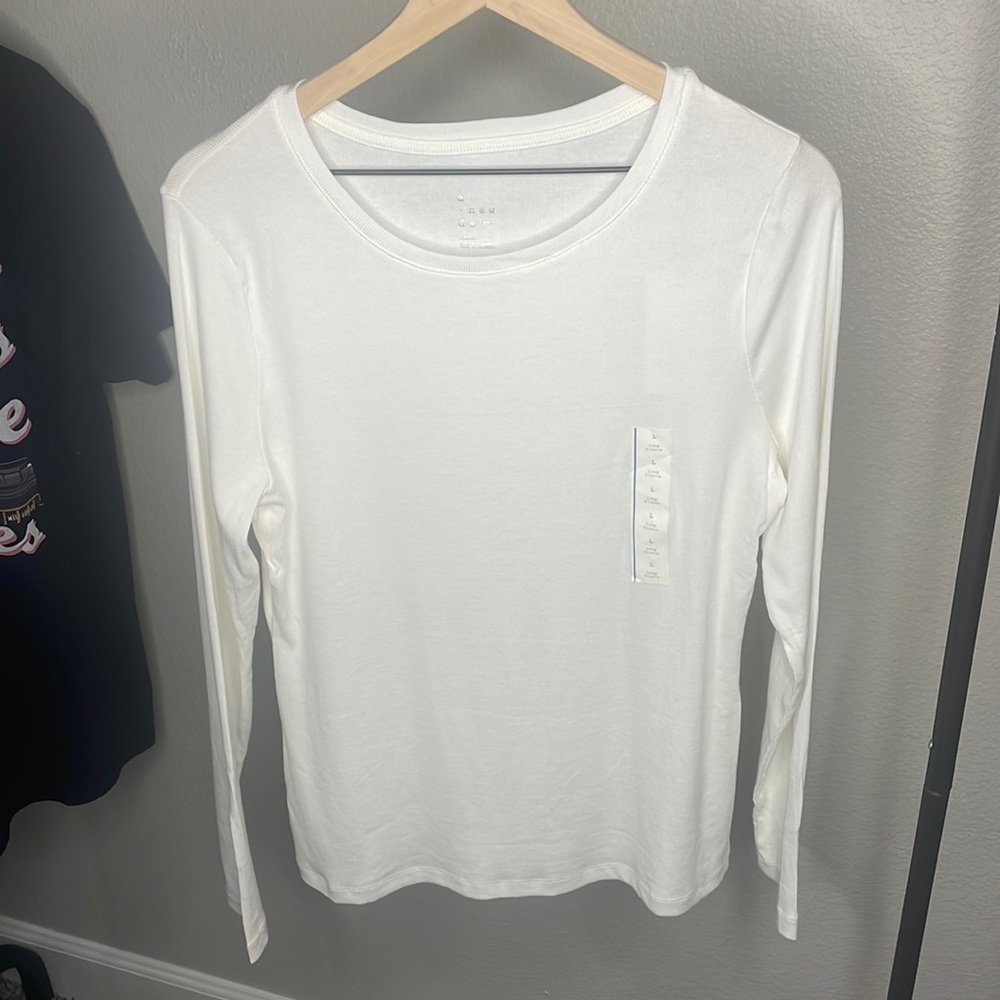 A new day cream colored top